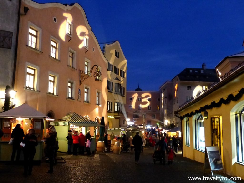 Hall Christmas Market with Advent calendar numbers on the walls.